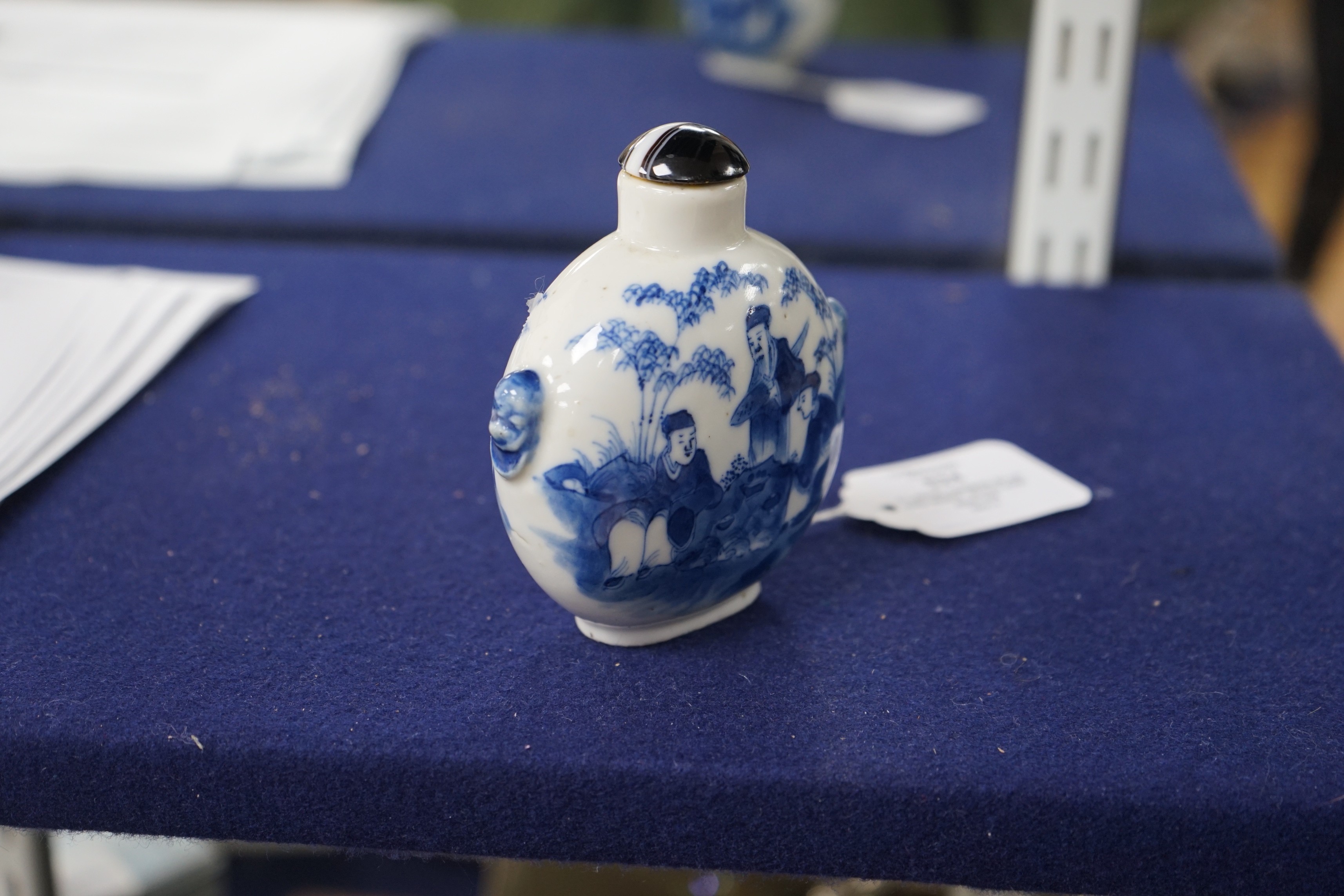 A large Chinese blue and white ‘scholars’ snuff bottle, 19th century, 9 cm high excluding later stopper